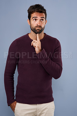 Buy stock photo Thinking, wonder and man in studio with unsure, uncertain and thoughtful on gray background in studio. Doubt mindset, mockup space and face of male person thoughtful for decision, choice and question