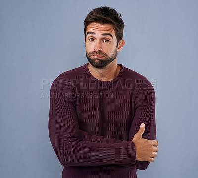 Buy stock photo Unsure, confused and portrait of man in studio with confused, uncertain and thoughtful on blue background. Thinking, mockup space and face of male person skeptical for decision, choice and question