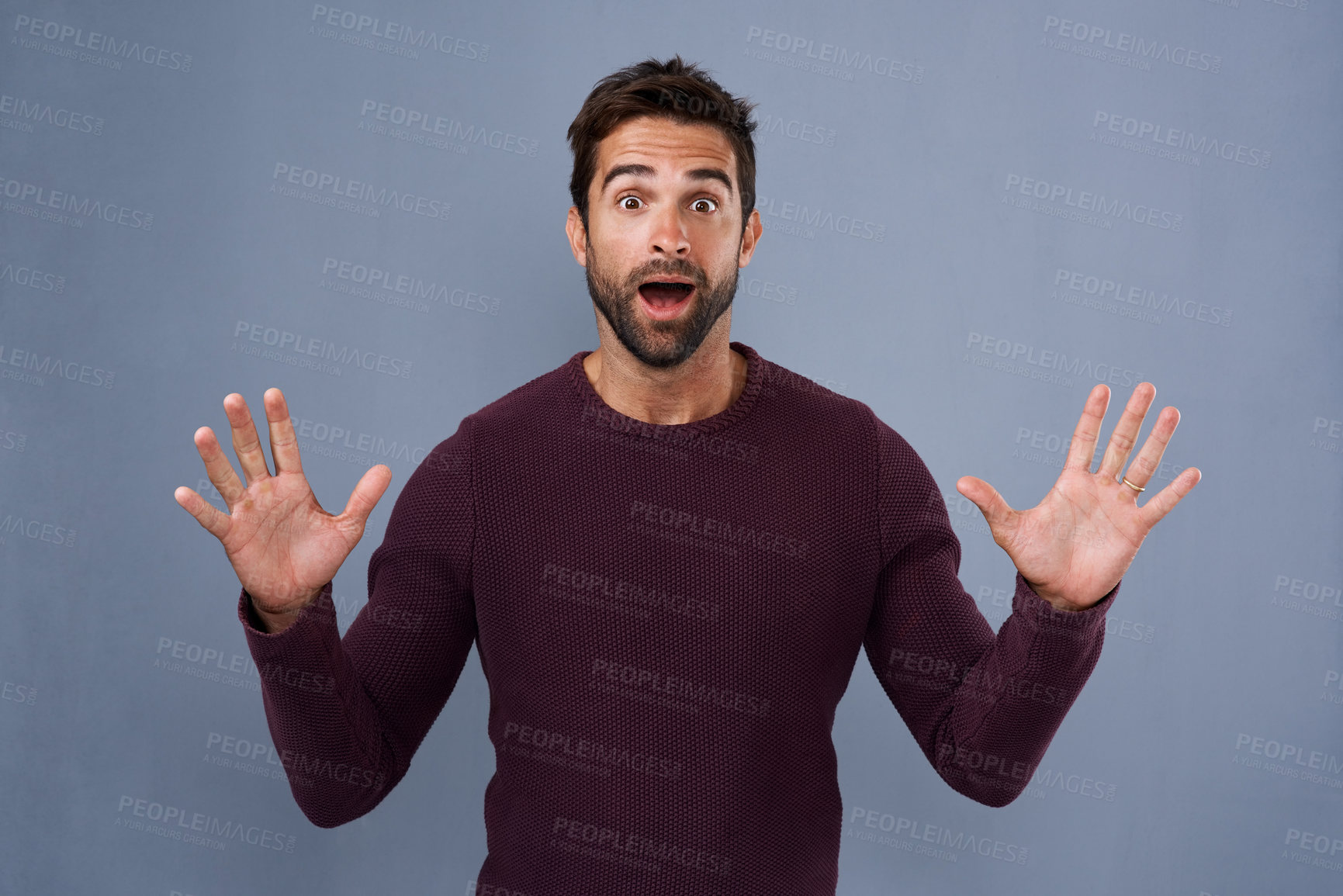 Buy stock photo Studio, portrait and shock with hands of man, comic and wow for news of discount and announcement. Blue background, banner and space for person, surprise and confused of gossip, rumor and information