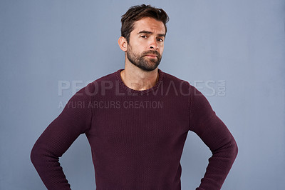 Buy stock photo Attitude, thinking and portrait of man in studio with confidence, uncertain and thoughtful on blue background. Confused, mockup space and male person skeptical for decision, choice and question