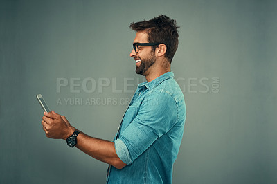 Buy stock photo Business, man and happy with tablet for reading email, notification or laughing for funny text message. Employee, smile or person with social media meme, video and mockup space with studio background