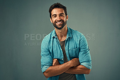 Buy stock photo Arms crossed, fashion and happy with portrait of man in studio on gray background for relaxed clothing style. Casual, confident and natural with smile of person in outfit to model clothes or shirt