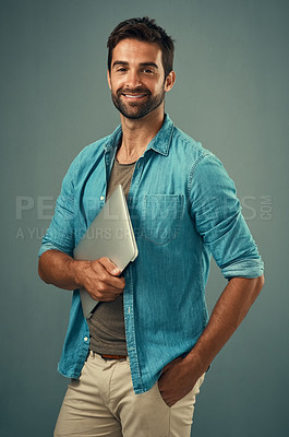 Buy stock photo Studio, portrait and businessman with laptop for research, planning and access information on internet. professional career, connect and web designer for online, software update and gray background