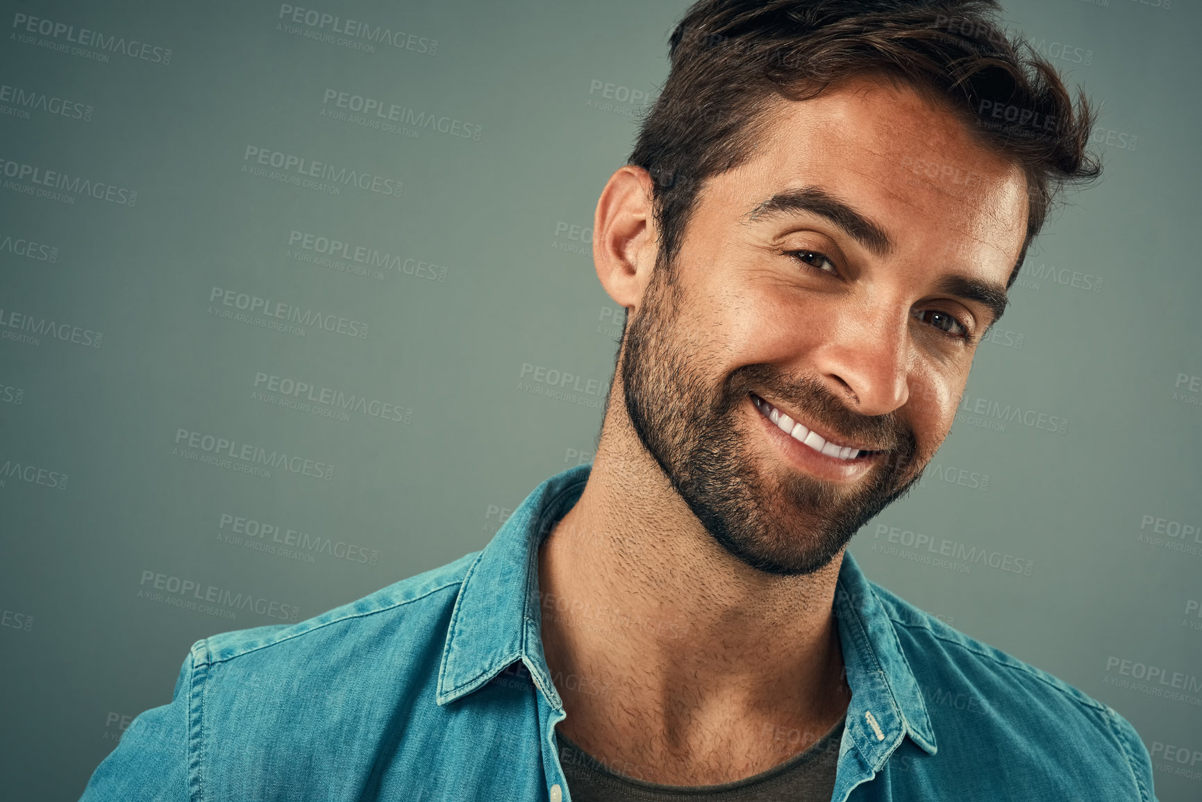 Buy stock photo Studio backdrop, man and fashion for style in portrait, trendy or cheerful with smile. Male person, happy and outfit with confidence, retail or sale in advertisement or promotion in gray background