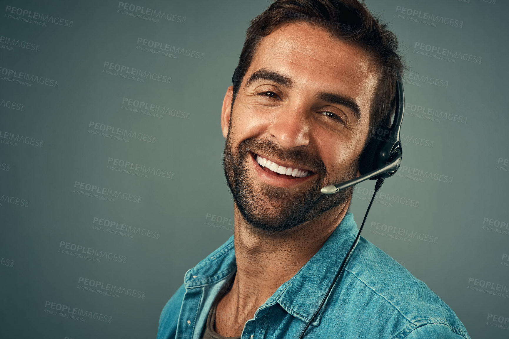 Buy stock photo Happy man, portrait and headphones for call center consulting against a grey studio background. Face of friendly male consultant agent with smile and headset in contact us for help or online advice