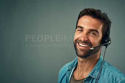 Buy stock photo Happy man, call center and portrait of consultant on mockup space against a grey studio background. Face of friendly male consulting agent with smile and headset in contact us, help or online advice