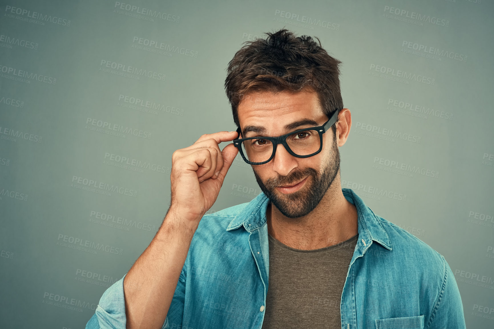 Buy stock photo Happy man, portrait and fashion with glasses for style in confidence on a studio background. Nerd, geek or handsome male person or model with smile or spectacles for eyewear or sight with space