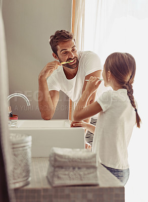 Buy stock photo Brushing teeth, father learning and child in a bathroom at home in morning with dental cleaning. Oral hygiene, kids and dad together in house with bonding and parent love for children with toothbrush