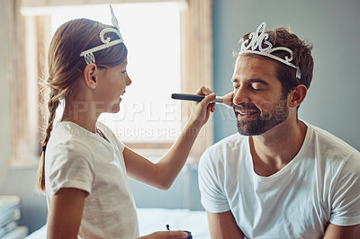 Buy stock photo Cropped shot of a little girl putting makeup on her father