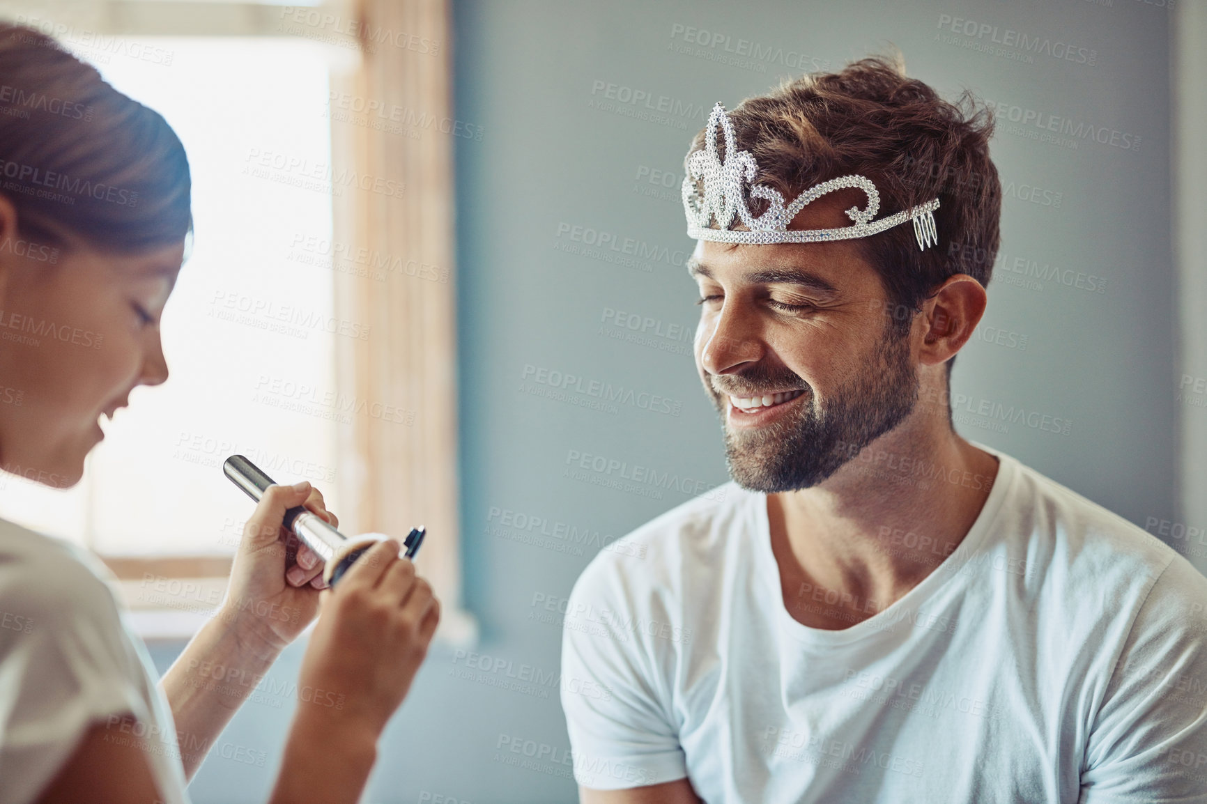 Buy stock photo Cropped shot of a little girl putting makeup on her father