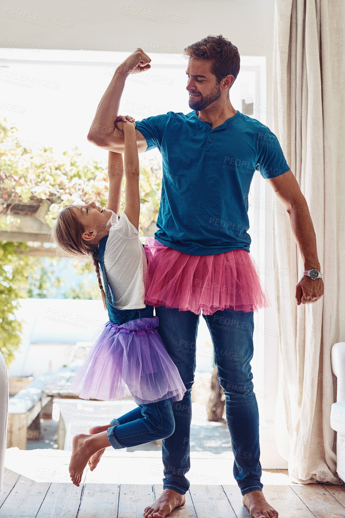 Buy stock photo Father, girl and playing in costume in home with holding arm for muscle flex, fun and strong arms in house. People, kid and bonding with love, support and dress up for child development and parenting