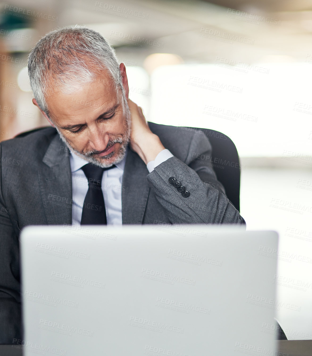 Buy stock photo Businessman, laptop and neck injury with pain in stress, accident or mistake at office. Mature man or employee with sore muscle, joint or inflammation on computer in debt or depression at workplace