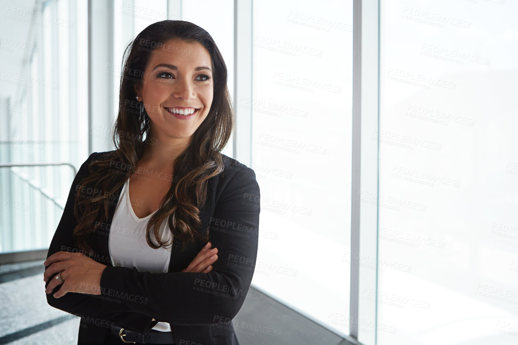 Buy stock photo Shot of a smiling businesswoman posing in an airport terminal