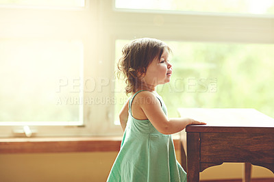 Buy stock photo Cropped shot of an adorable little girl playing at home