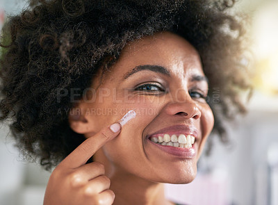 Buy stock photo Portrait, woman and hand with moisturiser for skincare, treatment and facial in home. Black person, happy and smile for dermatology, result and hydration with collagen boost, lotion and sunscreen