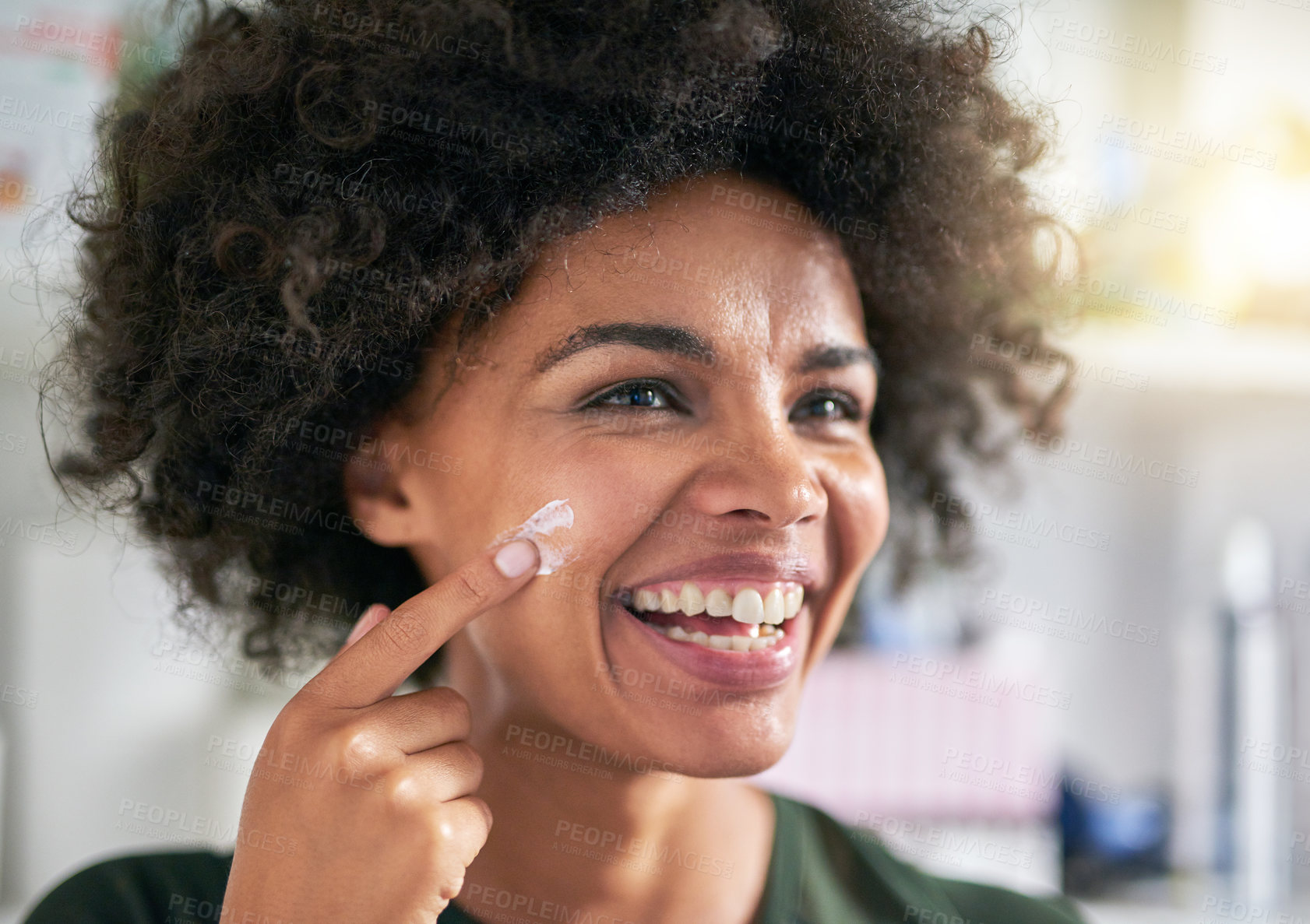 Buy stock photo Face, woman and laugh with lotion for skincare for pigmentation, texture or dermatology in home. Black person, happy and application of spf, sunscreen or moisturiser for sun, protection or treatment
