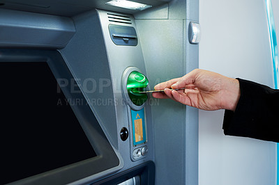 Buy stock photo Cropped shot of a businessman making a transaction at an ATM