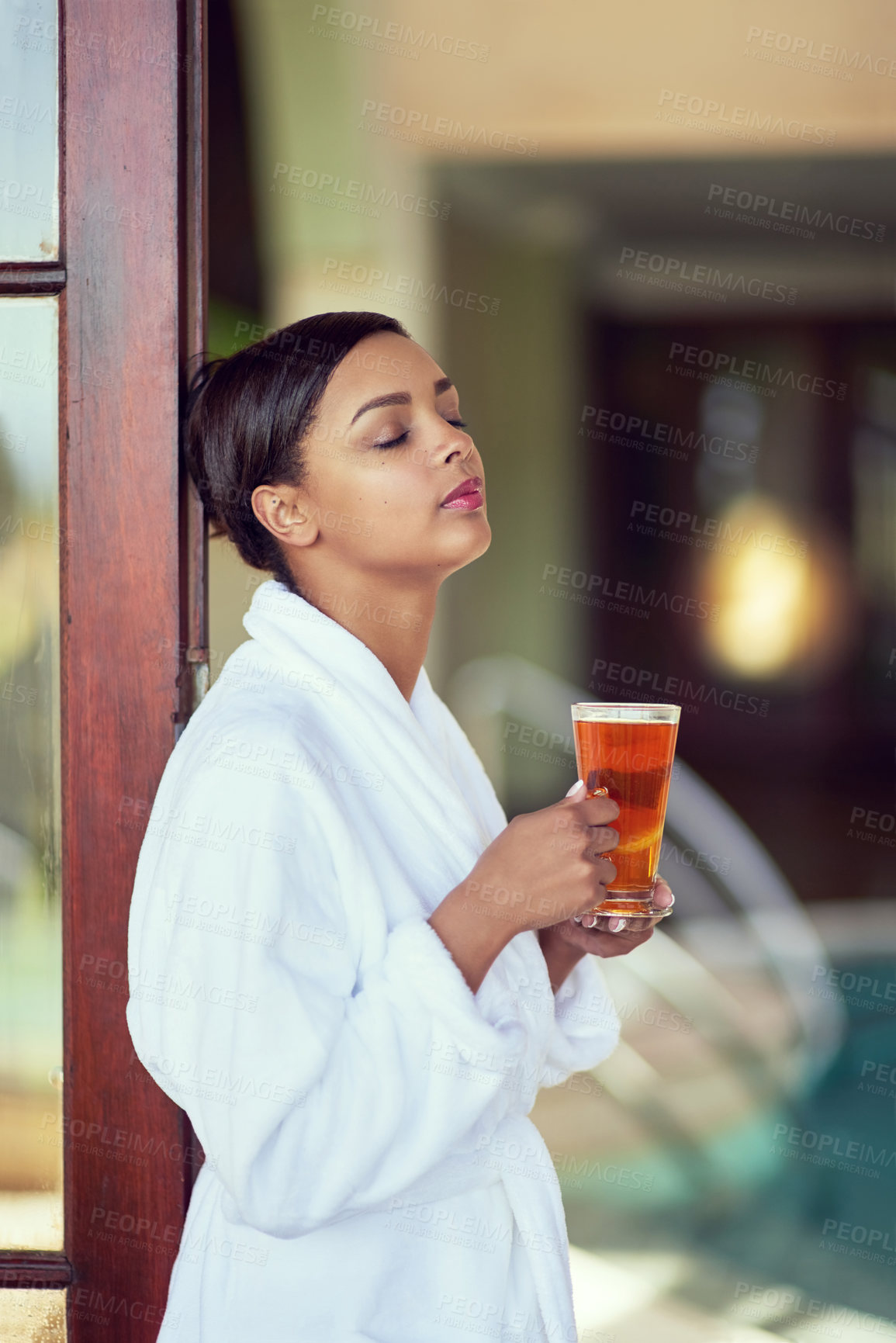 Buy stock photo Door, woman and relax at spa with tea on holiday, break and  luxury with thinking or mindfulness. Female person, lodge and gown with herbal drink on vacation, trip and travel for wellness at hotel