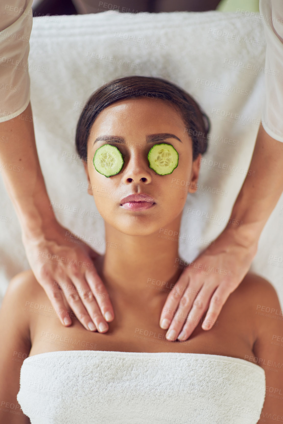 Buy stock photo Woman, spa and neck massage for beauty, masseuse hands and cucumber for dark circles. Resting, stress relief and calm for cosmetic and wellness, soothing therapy and natural or luxury treatment