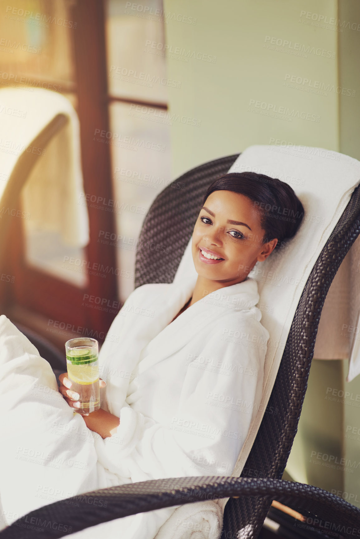 Buy stock photo Female person, portrait and spa with smile, drink and wellness in calm, relaxation and vacation in Bali. Woman, outdoor and health for body care with happiness in zen, peace and healing for holiday