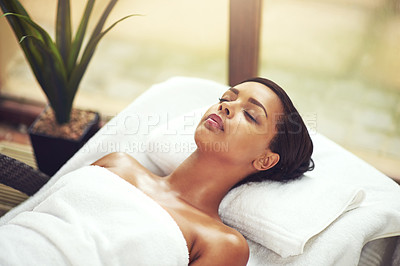 Buy stock photo Woman, salon and sleeping on bed for wellness in Thailand, relax and pamper for muscles. Female person, beauty or healing in spa for calm or peace, happiness or skin care with self love on vacation