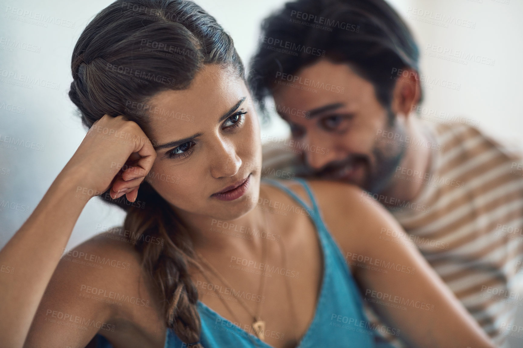 Buy stock photo Conflict, upset or sad with a couple arguing on a sofa in their home living room about an affair or breakup. Depression, unhappy or domestic violence with a woman thinking about divorce after a fight