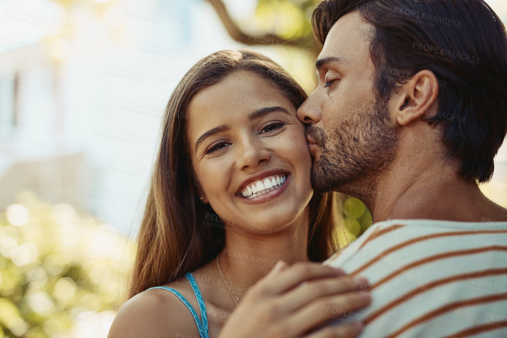 Buy stock photo Portrait, holiday or happy couple kiss in park to date, smile or enjoy anniversary together for love. Outdoor, romantic or people in nature for trust or bonding with care, support or special moment