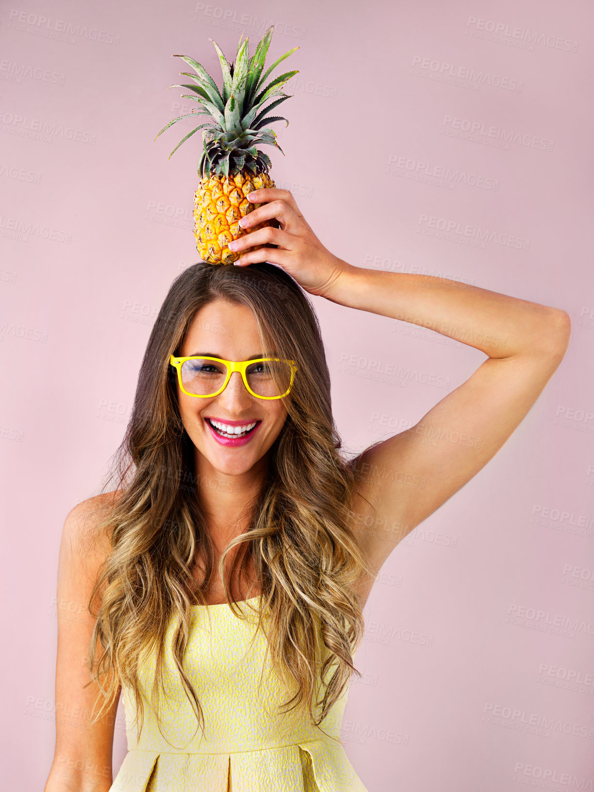 Buy stock photo Glasses, portrait or woman with pineapple on head in studio isolated on pink background. Funny, face or model with tropical fruit for healthy diet, wellness or happy for nutrition benefits on holiday