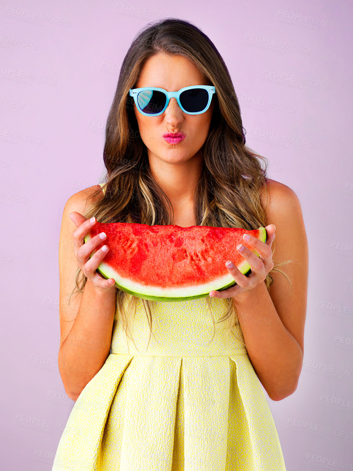 Buy stock photo Pout, woman and portrait with watermelon snack in studio for summer style, confident or smile with nutrition. Gen z model, fruit and sunglasses on pink background for diet, vitamins or healthy food