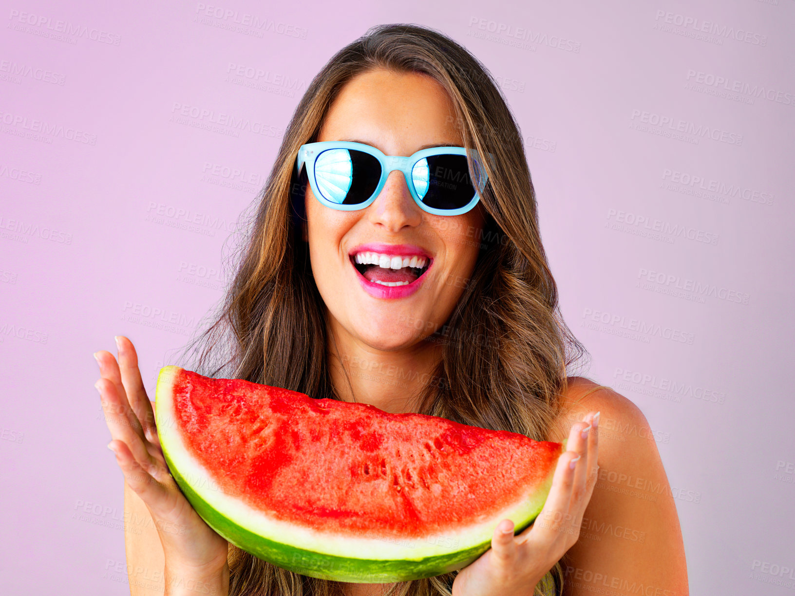 Buy stock photo Laugh, woman and portrait with watermelon snack in studio for summer style, confident or smile with nutrition. Gen z model, fruit and sunglasses on pink background for diet, vitamins or healthy food