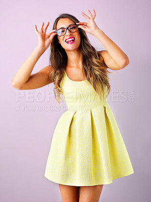 Buy stock photo Studio shot of a beautiful young woman posing against a pink background