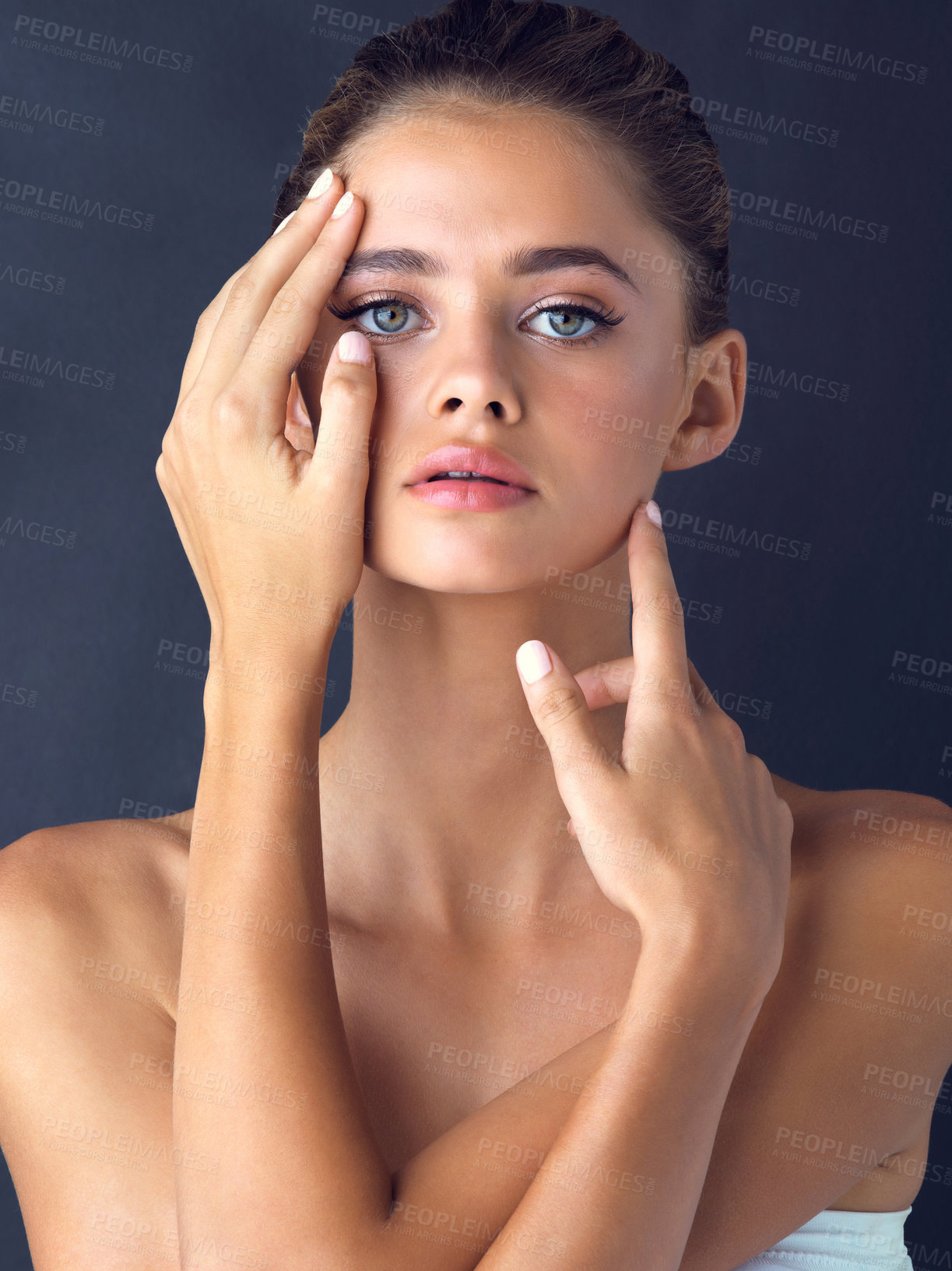 Buy stock photo Elegant, portrait and woman with skincare for beauty on black background with foundation, shine or glow. Face, confident model or proud girl in studio with cosmetics, hands or makeup for results