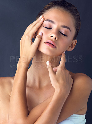 Buy stock photo Elegant, relax and woman with skincare for beauty on black background with foundation, shine or glow. Face, confident model and calm girl in studio with cosmetics, hands or makeup for results