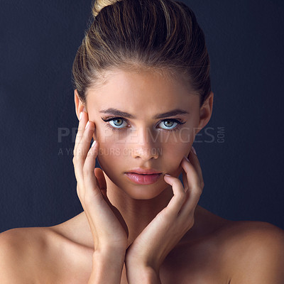 Buy stock photo Studio, portrait and woman face with serious for skincare, wellness and pride for healthy skin with touch. Girl model, beauty and cosmetics treatment for results, glowing tone and dark background