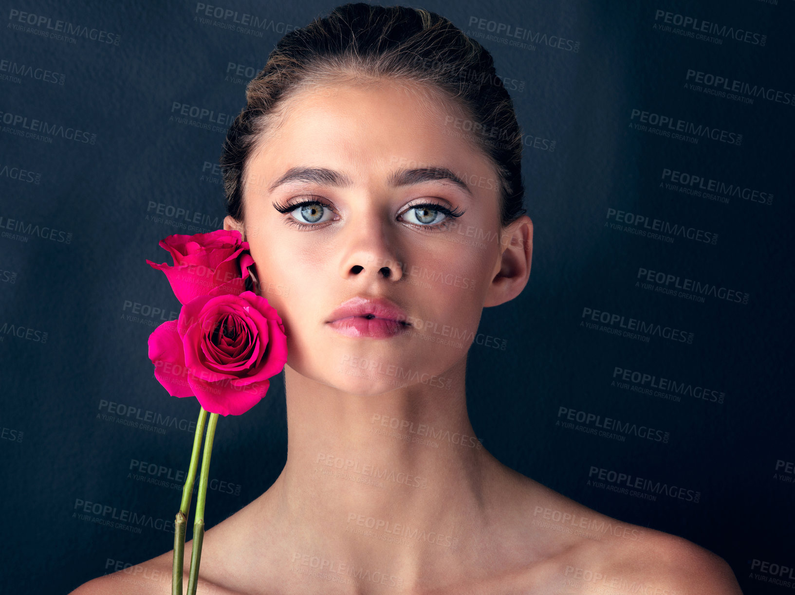 Buy stock photo Flower, portrait and girl with skincare for beauty on black background with foundation, shine or glow. Floral, confident model or proud woman in studio with cosmetics, hydration or makeup for results