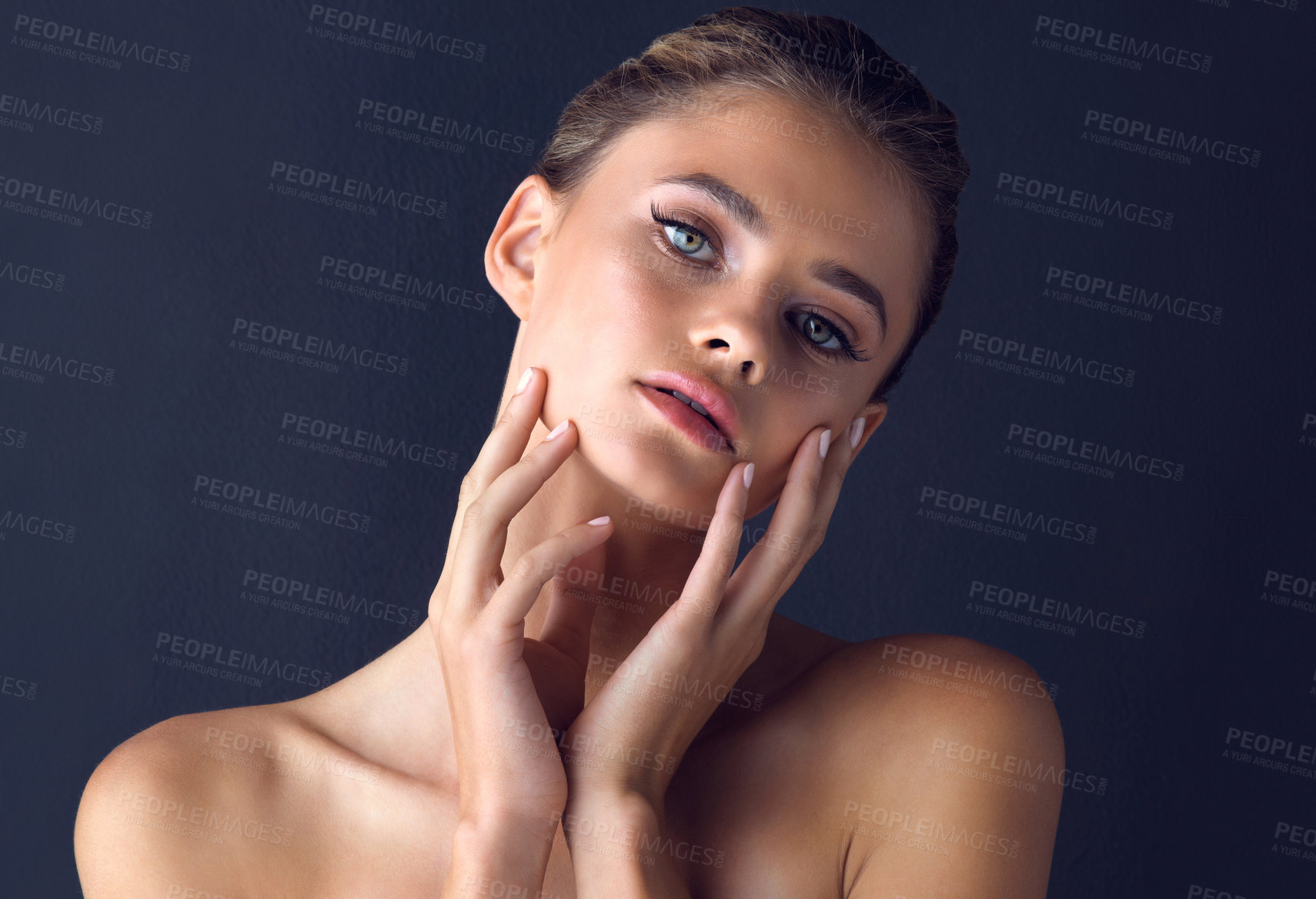 Buy stock photo Confidence, portrait and woman with skincare for beauty on dark background with foundation, shine amd glow. Face, model or proud girl in studio with cosmetics, hands and facial makeup for results