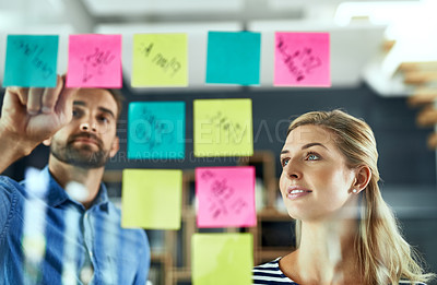 Buy stock photo Teamwork, people and sticky notes on glass for project ideas, planning and schedule management of startup. Woman, man and paper for brainstorming, support goals or productivity solution in office
