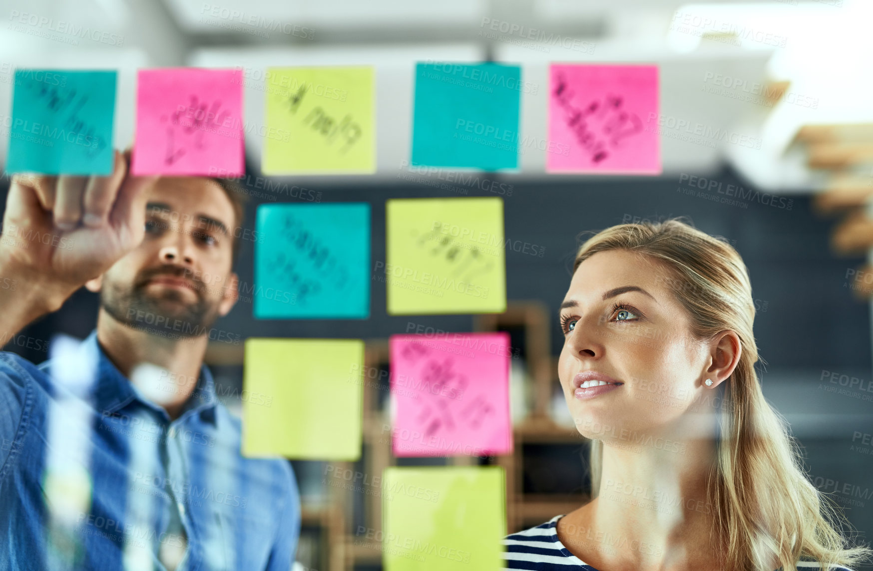 Buy stock photo Teamwork, people and sticky notes on glass for project ideas, planning and schedule management of startup. Woman, man and paper for brainstorming, support goals or productivity solution in office
