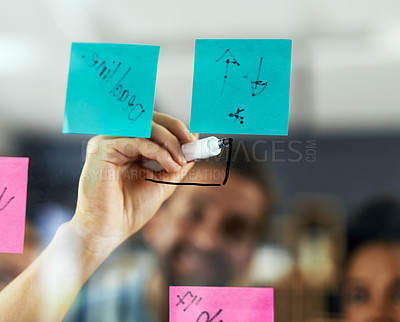 Buy stock photo Shot of colleagues having a brainstorming session in a modern office