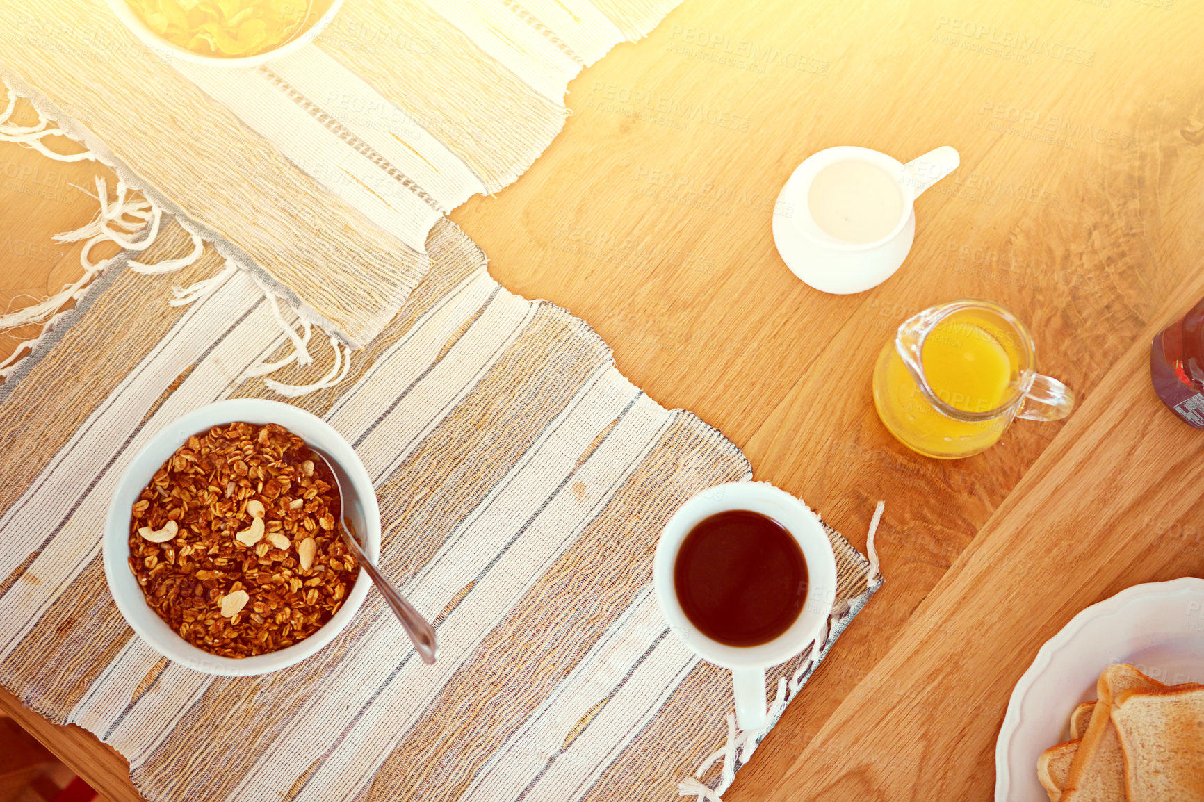 Buy stock photo High angle shot of an empty table set with breakfast foods