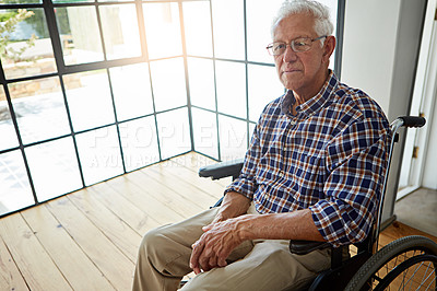Buy stock photo Cropped shot of a senior man sitting in his wheelchair in the retirement home