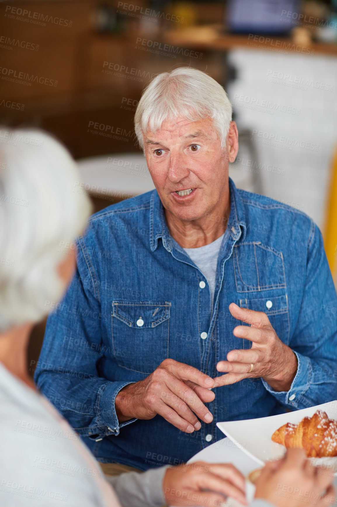 Buy stock photo Shot of a happy senior couple relaxing with a cup of coffee in a coffee shop