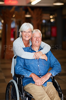 Buy stock photo Portrait of a happy senior couple bonding at the mall on the weekend