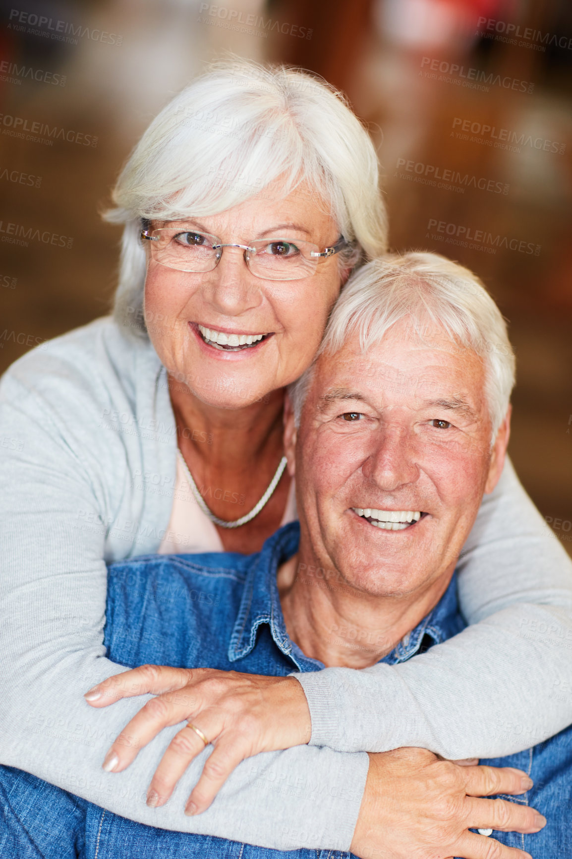 Buy stock photo Portrait of a happy senior couple bonding at the mall on the weekend