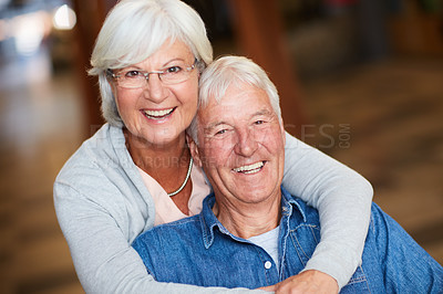 Buy stock photo Portrait of a happy senior couple bonding at the mall on the weekend