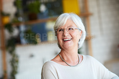 Buy stock photo Cropped shot of a senior man looking thoughtful while sitting in his local coffee shop