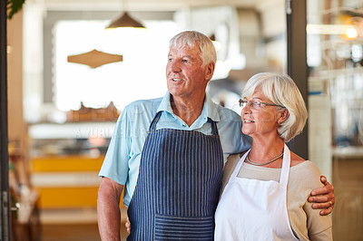 Buy stock photo Shot of a senior couple running a small business together