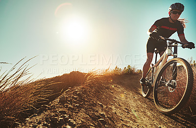 Buy stock photo Nature, cycling and mountain bike with fitness, training and extreme sport at morning on dirt path. Bicycle, person and cardio of athlete with hill and exercise for workout outdoor with mockup