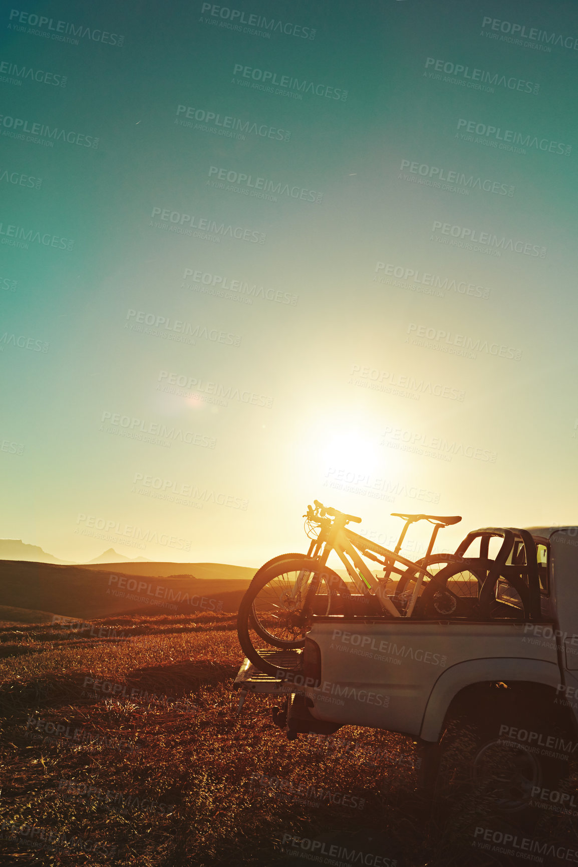 Buy stock photo Sports, morning and bicycle on car outdoors for training, workout and exercise in countryside. Fitness, cycling and mountain bike in vehicle for adventure, travel journey and transport at sunrise