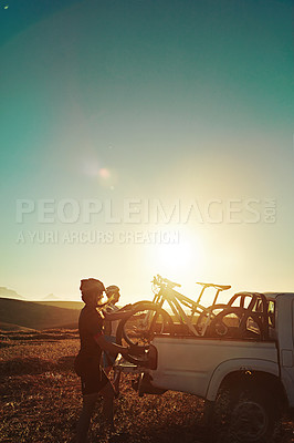 Buy stock photo Sports, men and bicycle on car in nature for training, workout and exercise in countryside. Fitness, cycling and friends with mountain bike in truck for outdoor adventure, travel journey or transport